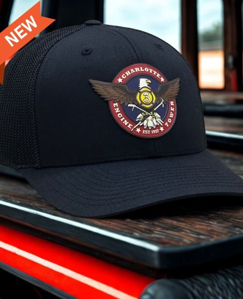 Customized Firefighter Patch Hat with an eagle in the center and Charlotte at the top and ENGINE and TOWER at the bottom with a 3 in the center. 