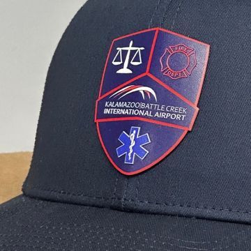 navy hat with uv printed badge shaped patch