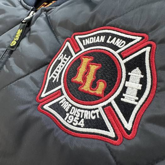 Embroidered "Indian Land Fire District 1954" patch on jacket