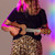 Lifestyle image of the Mad About Dark Wood soprano ukulele being played. Lightweight beginner ukulele with carbon strings, geared tuning pegs and a compact 21-inch design, ideal for children, students and first-time players learning chords, strumming and basic techniques.