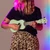 Lifestyle image of the Mad About Mint Green soprano ukulele being played. Lightweight beginner ukulele with carbon strings, geared tuning pegs and a compact 21-inch design, ideal for children, students and first-time players learning chords, strumming and basic techniques.