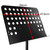 Perforated black metal desk of Tiger orchestral music stand showing dimensions of 47.5cm wide and 34cm high for sheet music support.