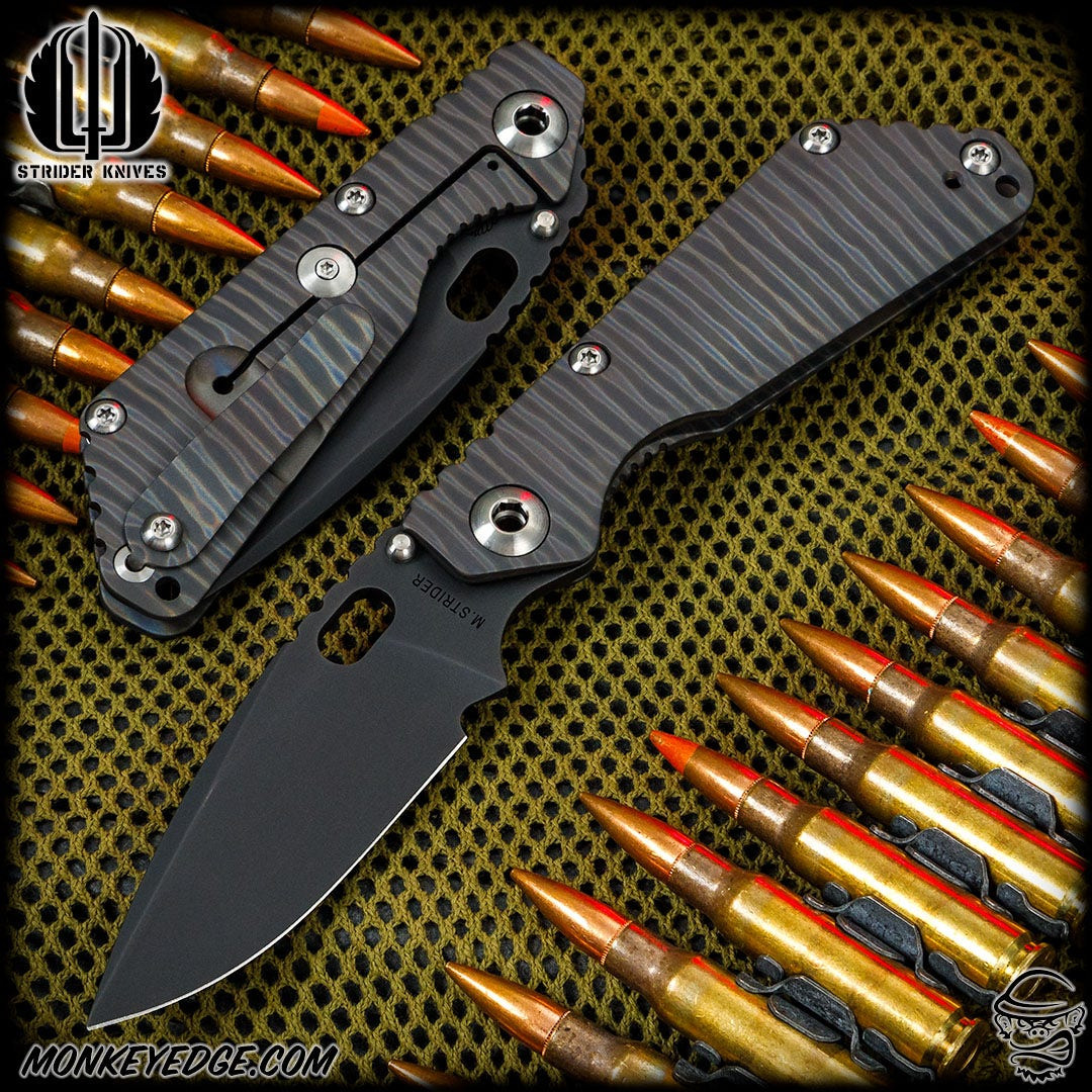 Monkey Edge - Strider Knives Folder: SnG CC Full Ti Dagger Grind