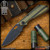 Strider Knives Folder: SnG Dagger Grind - Dirty Olive G10 Monkey Edge FRAG Pattern (CPM-3V)