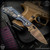 Strider Knives Folder: SnG Spearpoint Grind - Two Toned/Flamed Monkey Edge FRAG Pattern