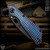 Strider Knives Folder: SnG 3/4 Grind - Black/Flamed Monkey Edge FRAG Pattern