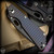 Strider Knives Folder: SnG Dagger Grind - Black/Flamed Monkey Edge FRAG Pattern