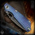 Strider Knives Folder: SnG Tanto w/Satin Spine - Black/Flamed Monkey Edge FRAG Pattern