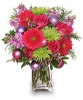 Send some Seasonal Style with this wonderfully festive Holiday Vased Flower Arrangement