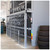 Lifestyle image of Vertical Tire Carousel - 28 inch Max Tire Diameter - Approximately 210 Tire Capacity shown in a real-world storage setting
