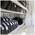 Lifestyle image of Vertical Tire Carousel - 28 inch Max Tire Diameter - Approximately 236 Tire Capacity shown in a clean storage environment