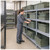 Lifestyle image of Attached Top Distribution Container - Gray - 100 lb Stack Capacity for small parts storage shown in a clean storage environment
