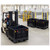 Lifestyle image of Collapsable Bulk Box - Black - 1,800 lb Capacity for small parts storage shown in a clean storage environment