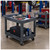 Lifestyle image of 3-Shelf Polymer Utility Cart - Gray - 550 lb Capacity for storage shown in a clean storage environment