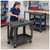 Lifestyle image of 3-Shelf Polymer Utility Cart - 550 lb Capacity - Gray for storage shown in a clean storage environment