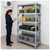Lifestyle image of Millenia 5-Shelf Mixed Polymer Shelving Unit - Gray for storage shown in a clean storage environment