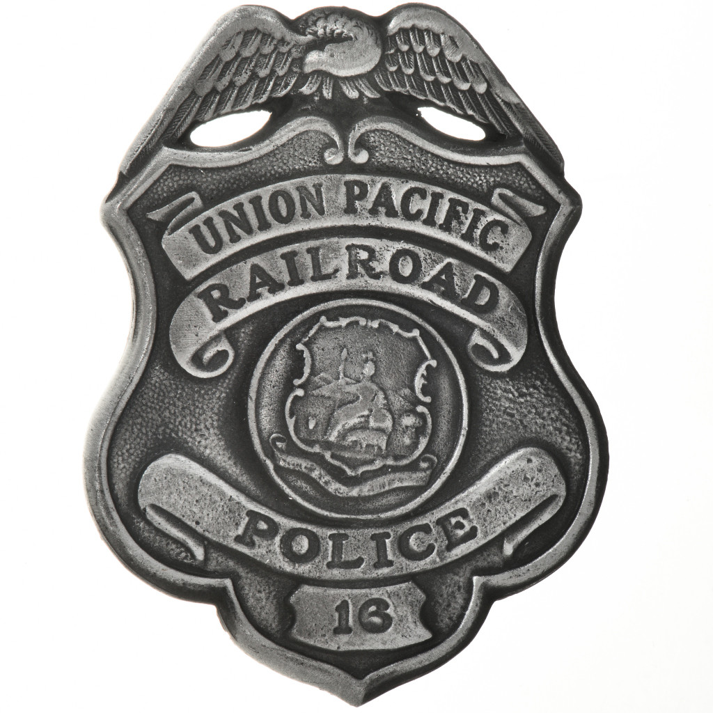 population police badge among the hidden