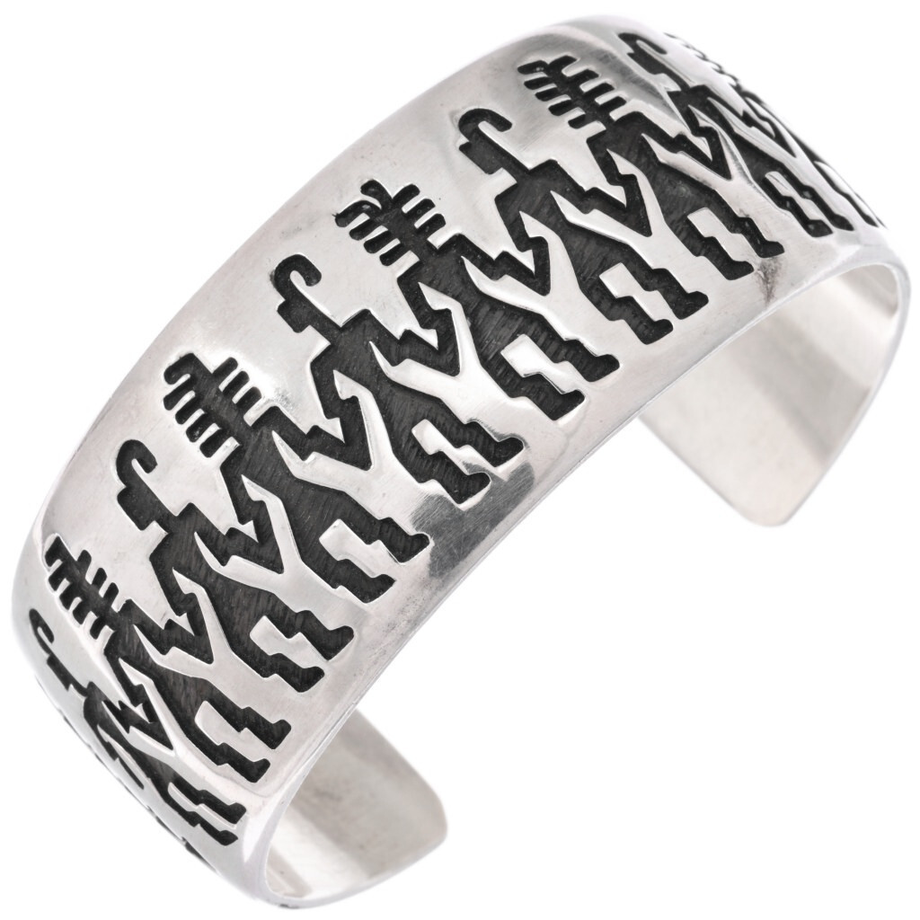 Featuring stylized Hohokam-inspired dancers, this vintage Hopi overlay bracelet is an example of how cultural imagery can inspire the bold, distinctive designs of Southwestern silverwork