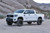 Fabtech 16-19 Toyota Tundra TRD PRO 4WD 4in Perf. System w/DL 2.5 Resi Coilovers & Rear DL Shocks