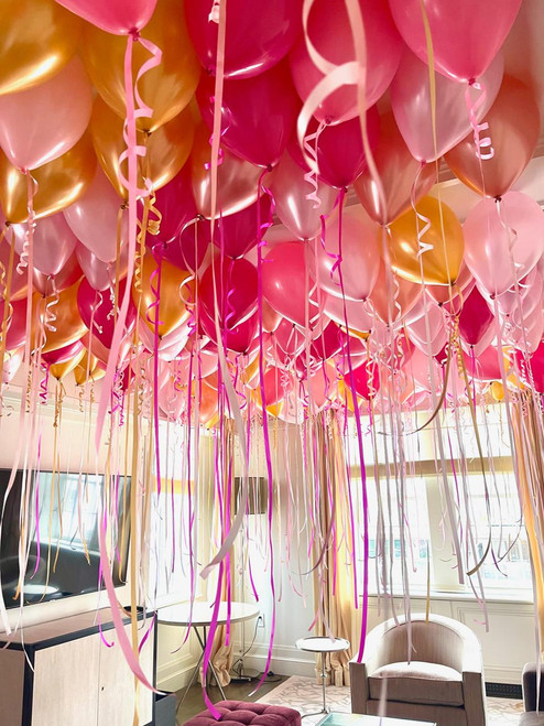 100 free-floating helium filled ceiling balloons Dallas