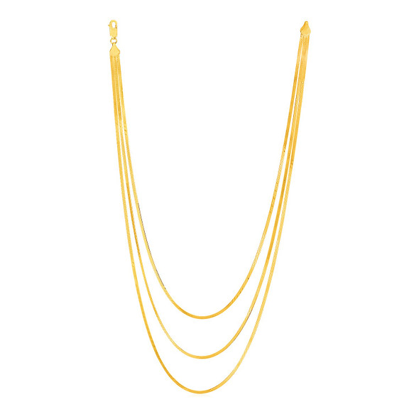 <html><head></head><body><p>Three classic herringbone chains of 14k yellow gold are joined beautifully into one timeless and versatile necklace. Shortest chain is 16 inches long.</p><div></div><div><div><div><table><h5>Product Specifications:</h5><tbody><tr><td> Metal </td><td> Yellow Gold </td></tr><tr><td> Metal Stamp</td><td> 14K </td></tr><tr><td> Style Name </td><td> Fancy </td></tr><tr><td> Chain Type </td><td> Herringbone </td></tr><tr><td> Clasp </td><td> Lobster Clasp </td></tr><tr><td> Approximate Weight </td><td> 9.5 gram(s) </td></tr></tbody></table></div></div></div></body></html> <html><head></head><body><p>Three classic herringbone chains of 14k yellow gold are joined beautifully into one timeless and versatile necklace. Shortest chain is 16 inches long.</p><div></div><div><div><div><table><h5>Product Specifications:</h5><tbody><tr><td> Metal </td><td> Yellow Gold </td></tr><tr><td> Metal Stamp</td><td> 14K </td></tr><tr><td> Style Name </td><td> Fancy </td></tr><tr><td> Chain Type </td><td> Herringbone </td></tr><tr><td> Clasp </td><td> Lobster Clasp </td></tr><tr><td> Approximate Weight </td><td> 9.5 gram(s) </td></tr></tbody></table></div></div></div></body></html>