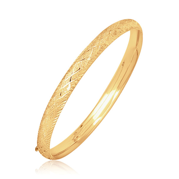 <html><head></head><body><p>Crafted in 14k yellow gold, this bangle is accentuated with diamond carved accents and features a hidden clasp.</p><div></div><div><div><div><table><h5>Product Specifications:</h5><tbody><tr><td> Metal </td><td> Yellow Gold </td></tr><tr><td> Metal Stamp</td><td> 14K </td></tr><tr><td> Style Name </td><td> Fancy </td></tr><tr><td> Width </td><td> 0.24 in </td></tr><tr><td> Clasp </td><td> Hidden Clasp </td></tr><tr><td> Approximate Weight </td><td> 6.7 gram(s) </td></tr></tbody></table></div></div></div></body></html>