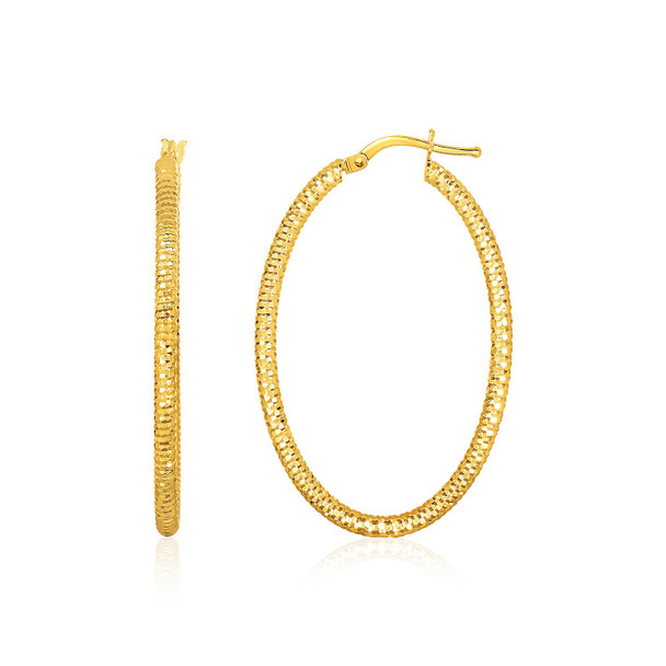 <html><head></head><body><p>These dramatic gold oval earrings with a fine texture display just a hint of sparkle. Ovals are 36 millimeters long and 16.2 millimeters wide and close with a snap lock.</p><div></div><div><div><div><table><h5>Product Specifications:</h5><tbody><tr><td> Metal </td><td> Yellow Gold </td></tr><tr><td> Metal Stamp</td><td> 14K </td></tr><tr><td> Style Name </td><td> Hoops </td></tr><tr><td> Width </td><td> 0.63 in </td></tr><tr><td> Backing </td><td> Snap Lock </td></tr><tr><td> Length </td><td> 1.41 in </td></tr><tr><td> Approximate Weight </td><td> 2.2 gram(s) </td></tr></tbody></table></div></div></div></body></html>