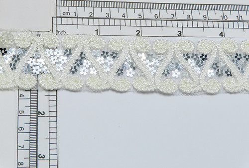 Scroll & Sequin Mesh Trim 1 1/2" Sparkly Ivory Per Yard

The sequins are a silver color in a flower shape

Very sparkly