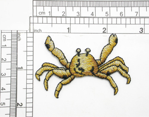 Crab Metallic Gold Iron On Patch Applique
Fully Embroidered in Metallic Gold & Black Thread
Measures 2 9/16" across x 1 5/8" high