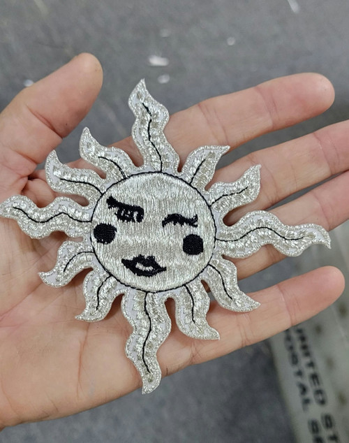Winking Sun Metallic Silver Embroidered Iron on Applique