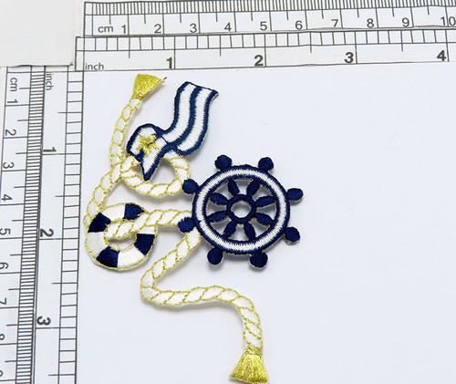 Nautical Rope Wheel Preserver & Flag Right Applique
Fully Embroidered 
Measures 2 1/2" across x 3 1/2" high