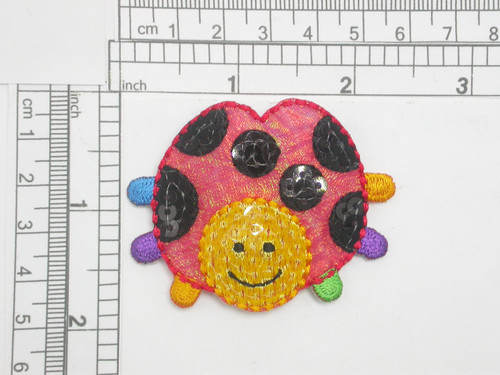 Ladybug Sequin Sparkle Iron On Patch Applique

Embroidered on Opalescent Backing with Rayon Threads

Measures 1 3/4" high x 2 1/4" wide approximately