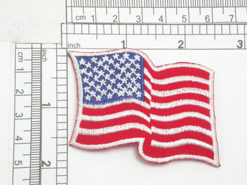 American Flag USA Iron On Patch Applique 

 Embroidered with rayon Threads on a Red Twill Backing

 Measures 2 1/2" across by 1 3/4" high