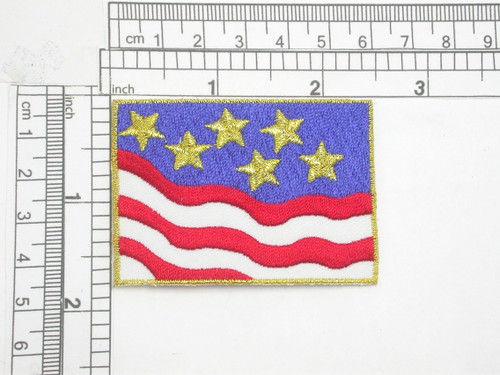 Stars & Stripes Patch Iron On Patch Applique 

 Embroidered with rayon and Metallic Thread on a White Twill Backing

 Measures 2 1/2" across by 1 3/4" high