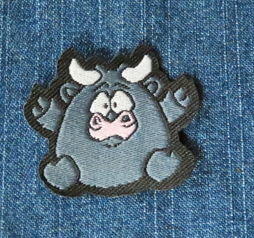 Toon Bull Iron on Woven Patch  Applique     

Measures 47mm x 41mm (1 7/8" x 1 5/8") approx