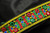 Mirrored Boho Style Embroidered Trim 2 1/8" 54mm Priced Per Yard

Bright Vibrant Thick Embroidery on a black backing - edges are folded and stitched to prevent fraying

Mirrors are a plastic not glass

 