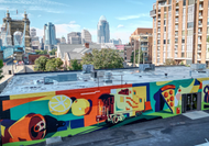 MAKING A MARK: Rust-Oleum’s Spray It Forward Mural Lights Up Covington