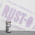 A can of Rust-Oleum spray paint in front of a spray-painted logo on a wall.