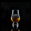 Wholesale engraved Wee Glencairn Glass customized with Casey Jones Distillers logo on a black background