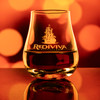 Wholesale engraved 8.5 oz. Urban Bar Spey Whiskey Rocks Glass customized with Rediviva logo on a bokeh background
