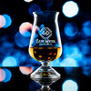 Wholesale engraved Túath Irish Whisky Glass customized with Clear Water Distilling logo on a bokeh background