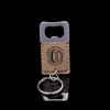Wholesale engraved Square Tan Keychain Opener customized with Cooperstown Distillery logo on a black background