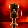 Wholesale engraved Classic Irish Cream Mug customized with Devils Due Distillery logo on a bokeh background