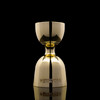 Wholesale engraved Gold Vintage Jigger customized with McMenamins Spirits logo on a black background