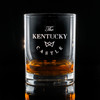Wholesale engraved 14.25 oz. Stolzle New York Rocks Glass customized with The Kentucky Castle logo on a black background