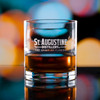 Wholesale engraved 12.5 oz. Bespoke Cigar Glass customized with St Augustine Distillers logo on a bokeh background