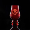 Wholesale engraved Red Glencairn blind tasting glass customized with Devils Due Distillery logo on a black background