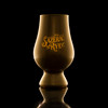Wholesale engraved Gold Glencairn blind tasting glass customized with Eagle Rare Whiskey logo on a black background