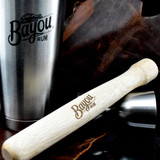 Wholesale engraved 9" Natural Wood Muddler customize with Bayou Rum logo on a black background