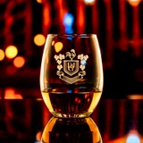Wholesale engraved 9 oz. Cask Tumbler customized with EJ Gallo logo on a bokeh background